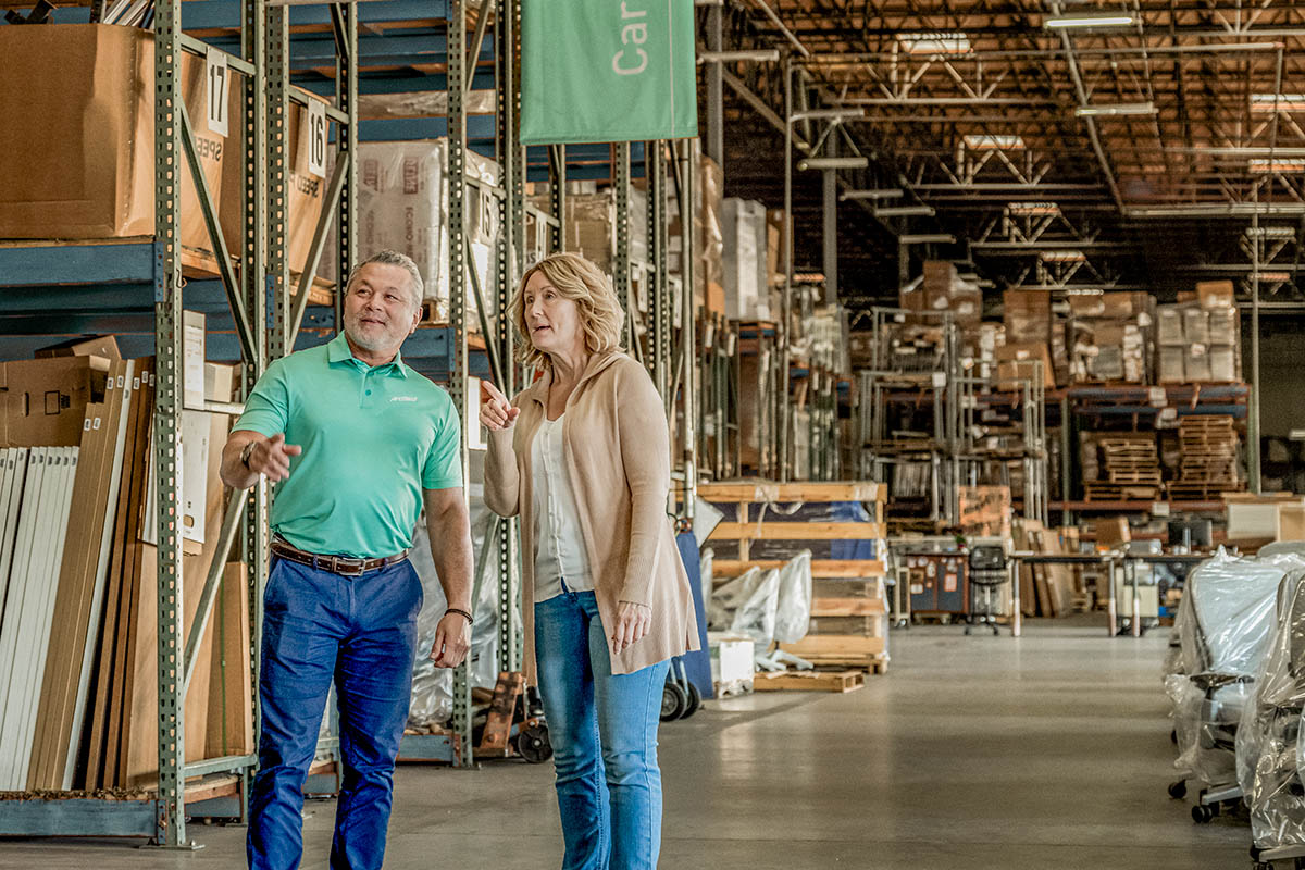 Customer and ArcBest Rep in a Warehouse