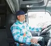 Owner Operator driving tractor trailer