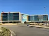 Photo of ArcBest headquarters with the Heart of 100 logo